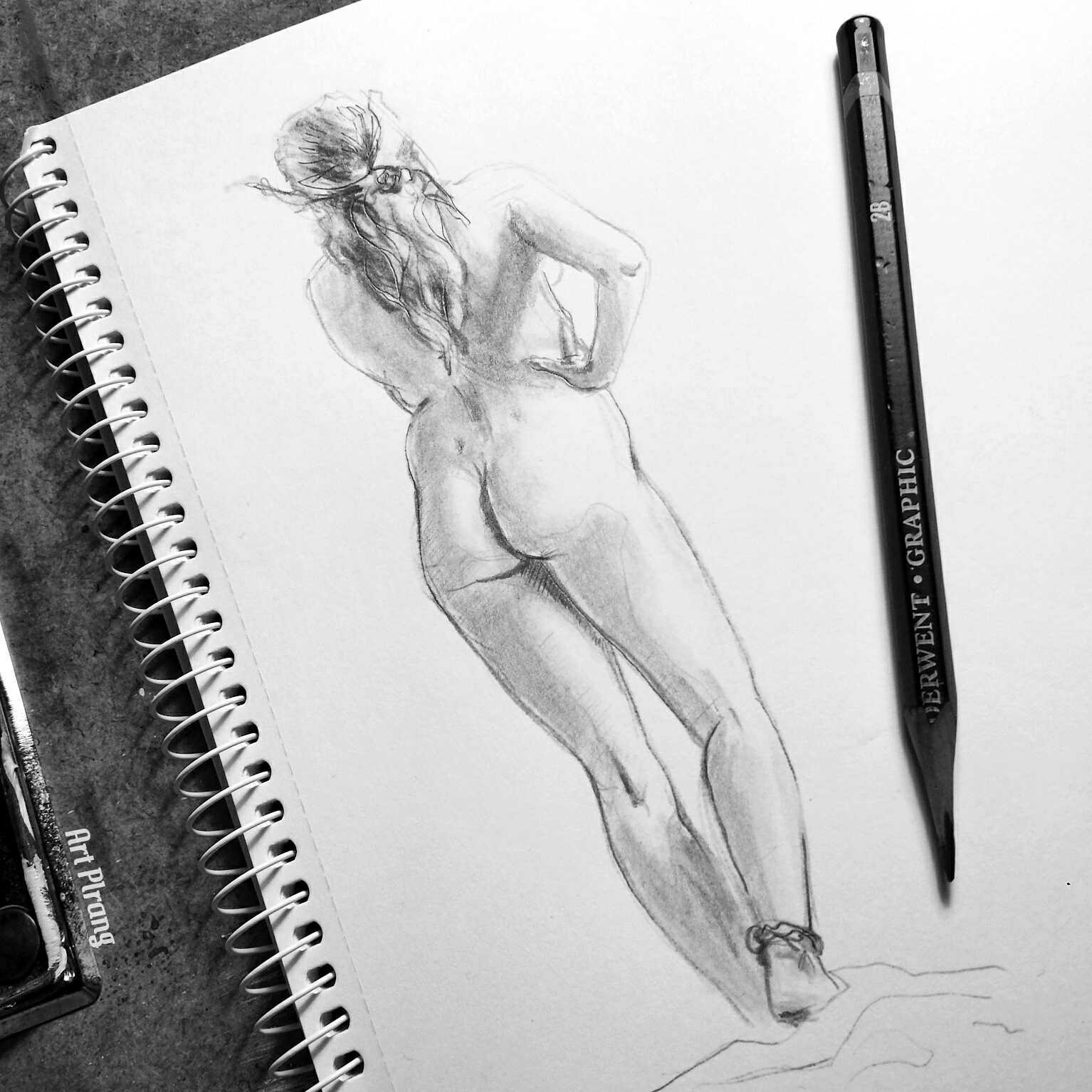 Nude woman figure from the back